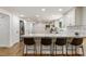 Updated kitchen with modern countertops, stainless appliances, and sleek breakfast bar seating at 321 Crabtree Court, Marietta, GA 30068