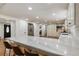 Open kitchen with marble countertops, stainless steel appliances and breakfast bar seating at 321 Crabtree Court, Marietta, GA 30068