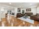 Inviting living room features hardwood floors, coffered ceilings, and a seamless flow to the outdoor patio at 321 Crabtree Court, Marietta, GA 30068