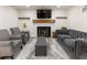 Inviting living room with a fireplace, comfortable seating and lots of natural light at 321 Crabtree Court, Marietta, GA 30068
