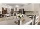Open kitchen and dining area featuring a large distressed wood table and views of the kitchen at 35 Westfair Ct, Atlanta, GA 30328