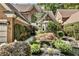 Lovely brick home with a manicured front yard and an arched window at 35 Westfair Ct, Atlanta, GA 30328