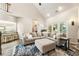 Open floor plan showcasing a living room with a large sectional couch and access to the backyard at 35 Westfair Ct, Atlanta, GA 30328