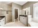 Modern main bathroom boasts a glass shower, soaking tub, and double sink vanity at 35 Westfair Ct, Atlanta, GA 30328