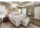 Spacious main bedroom features a trey ceiling, wood floors, and natural light at 35 Westfair Ct, Atlanta, GA 30328