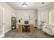 Bright home office featuring hardwood floors, desk, and natural light at 35 Westfair Ct, Atlanta, GA 30328