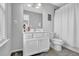 Well-lit bathroom features a vanity with storage, and a shower-tub combo at 4445 Hager Ct, Cumming, GA 30040