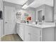 Bright bathroom featuring double vanities with quartz countertops, providing ample space and style at 4445 Hager Ct, Cumming, GA 30040