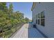 Relaxing back deck with comfortable seating area, ideal for enjoying peaceful outdoor living at 4445 Hager Ct, Cumming, GA 30040