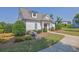 Charming home exterior with manicured landscaping, stone accents, and a welcoming walkway at 4445 Hager Ct, Cumming, GA 30040