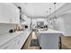 Bright, modern kitchen featuring an island, sleek countertops, and stainless steel appliances at 4445 Hager Ct, Cumming, GA 30040