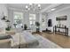 Inviting living room featuring hardwood floors, neutral colors, and natural light at 4445 Hager Ct, Cumming, GA 30040