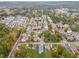 Areal view of homes in a well maintained neighborhood surrounded by mature trees and landscaping at 474 Haley Se St, Marietta, GA 30060
