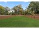 Large, well-maintained backyard with a lush lawn and a privacy fence at 474 Haley Se St, Marietta, GA 30060