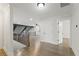 Open concept bonus room with hardwood floors and a view of the downstairs living spaces at 474 Haley Se St, Marietta, GA 30060