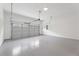 Clean and bright garage with painted floors and an automatic door at 474 Haley Se St, Marietta, GA 30060