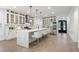 Spacious kitchen with large island, quartz countertop, modern stainless steel appliances, and ample cabinet space at 474 Haley Se St, Marietta, GA 30060