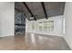 Bright living room highlighting hardwood flooring and a marble fireplace feature at 474 Haley Se St, Marietta, GA 30060