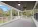 Covered outdoor patio with a dark wood ceiling, providing a relaxing space for entertaining at 474 Haley Se St, Marietta, GA 30060