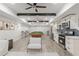 Entertaining recreation room showcasing a billiards table, kitchen with stainless appliances, and luxury vinyl floors at 474 Haley Se St, Marietta, GA 30060