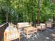 Relaxing deck with outdoor seating and a grill, perfect for entertaining and enjoying the outdoor space at 2348 Logan Ne Cir, Brookhaven, GA 30319