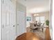 Elegant dining room with hardwood floors and classic wainscoting details at 2348 Logan Ne Cir, Brookhaven, GA 30319