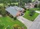 Aerial view of home with mature trees, manicured lawn, and private backyard at 3011 Stillwater Dr, Villa Rica, GA 30180