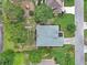 Birds eye view of home with mature trees, manicured lawn, and private backyard at 3011 Stillwater Dr, Villa Rica, GA 30180