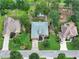 Aerial view of home with mature trees, manicured lawn, and private backyard at 3011 Stillwater Dr, Villa Rica, GA 30180