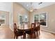 Bright dining area features views of landscaped yard and patio doors at 3011 Stillwater Dr, Villa Rica, GA 30180