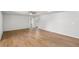 Large, bright room with wood floors and neutral paint at 1260 White Oak Se St, Conyers, GA 30013