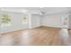 Spacious living room featuring lots of natural light and wood floors at 1260 White Oak Se St, Conyers, GA 30013