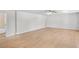 Large living area with new floors and bright, neutral paint at 1260 White Oak Se St, Conyers, GA 30013
