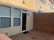 Rear wood deck with open door to interior at 1749 Breyerton Ne Dr, Atlanta, GA 30329