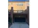 A spacious garage with an ADT security sign and back porch at 1749 Breyerton Ne Dr, Atlanta, GA 30329