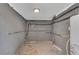 Unfinished basement featuring gray concrete block and a water heater at 356 Lake Dr, Atlanta, GA 30354