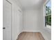 Bedroom with a window for natural light and a closet with panel doors at 356 Lake Dr, Atlanta, GA 30354