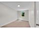 Bedroom featuring neutral carpet, natural light, and white trim throughout at 356 Lake Dr, Atlanta, GA 30354