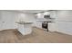 This modern kitchen features white cabinets and stainless steel appliances at 356 Lake Dr, Atlanta, GA 30354