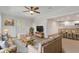 Cozy living room with a view to the kitchen, complete with comfortable seating and a ceiling fan at 356 Lake Dr, Atlanta, GA 30354