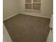 Bedroom featuring neutral carpeting and bright natural light from the windows at 2083 Meador Se Ave, Atlanta, GA 30315