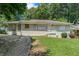 Charming single-story home with a quaint front porch and a well-maintained lawn at 2083 Meador Se Ave, Atlanta, GA 30315