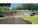 Ranch home with a painted brick facade, covered front porch, and mature trees at 2083 Meador Se Ave, Atlanta, GA 30315
