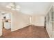 Open-concept living room with hardwood floors leading into kitchen at 2083 Meador Se Ave, Atlanta, GA 30315