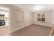 Inviting living room featuring new carpet and view into the kitchen at 2083 Meador Se Ave, Atlanta, GA 30315