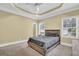 Bright bedroom offers a ceiling fan, recessed lighting and natural light, creating a cozy atmosphere at 219 1St St, Woodstock, GA 30188
