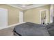 This bedroom boasts an attached bathroom for easy access and added privacy, plus plenty of natural light at 219 1St St, Woodstock, GA 30188
