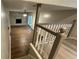 Finished basement with fireplace, wood floors, and access to the backyard at 4550 Cypress Ridge Ct, Stone Mountain, GA 30083