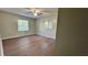 Bedroom with wood floors and natural light at 4550 Cypress Ridge Ct, Stone Mountain, GA 30083