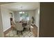 Traditional dining room with hardwood floors, six chairs and modern chandelier at 4550 Cypress Ridge Ct, Stone Mountain, GA 30083